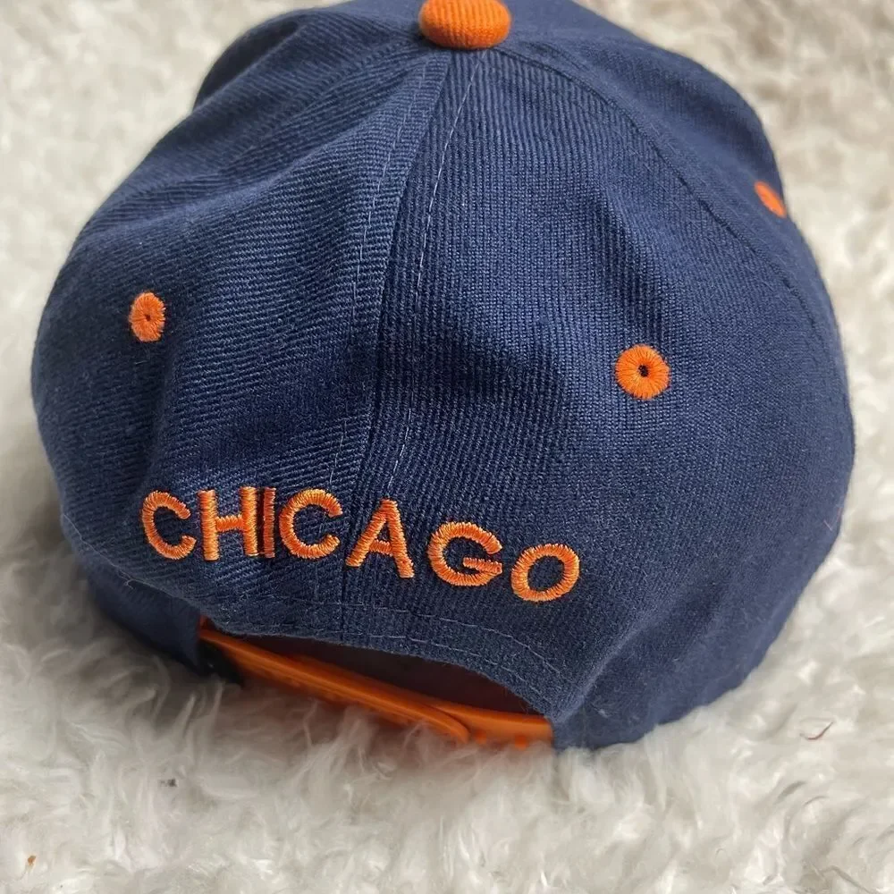 E-Flag Chicago snap back Navy Blue and orange cap adjustable back strap.